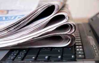 Newspapers Still Reach the Affluent, Educated