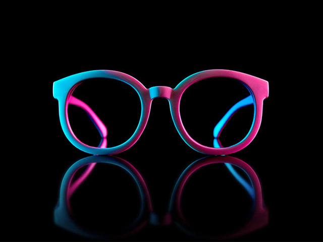 Colorful glasses on a black background