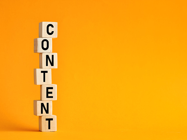 Blocks stacked on top of each other spelling the word content